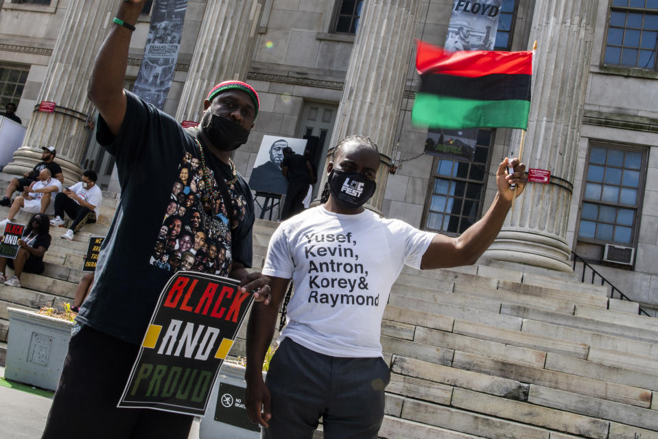 People attend a rally with Terrence Floyd, brother of George Floyd, on Sunday, May 23, 2021, in Brooklyn borough of New York. George Floyd, whose May 25, 2020 death in Minneapolis was captured on video, plead for air as he was pinned under the knee of former officer Derek Chauvin, who was convicted of murder and manslaughter in April 2021. (AP Photo/Eduardo Munoz Alvarez)