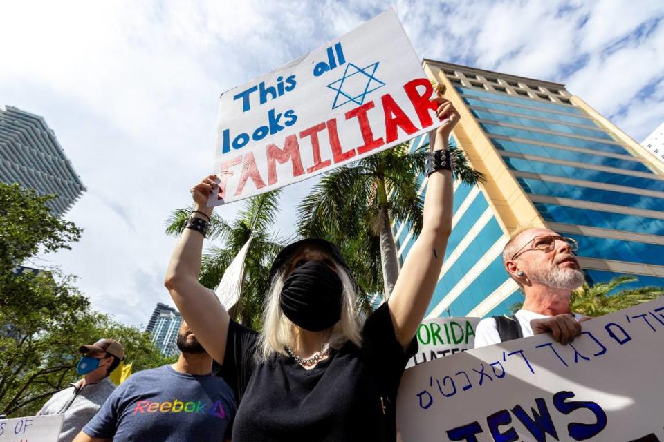 Protesters against Ron DeSantis march down Brickell Avenue from Brickell Park to The Four Seasons in Miami, Florida, on Wednesday, May 24, 2023.