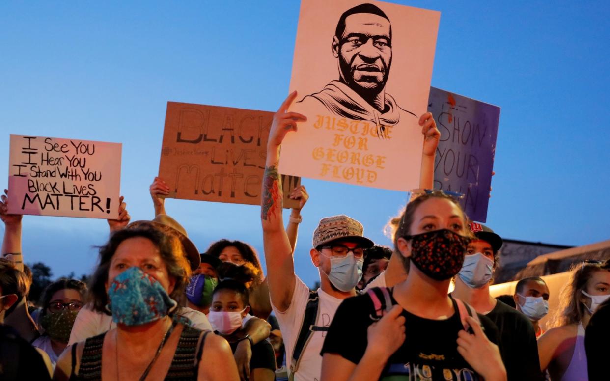 A protest in memory of George Floyd in Minneapolis  - Reuters