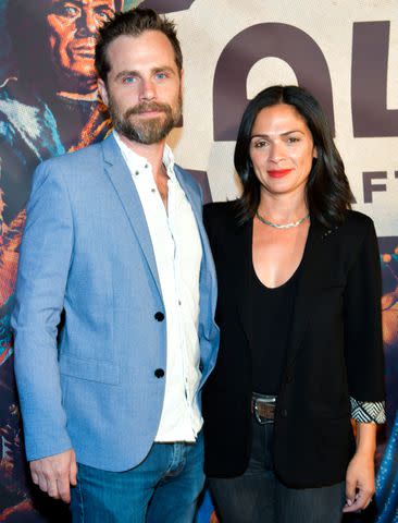 <p>Rodin Eckenroth/Getty</p> Rider Strong and Alexandra Barreto in 2019