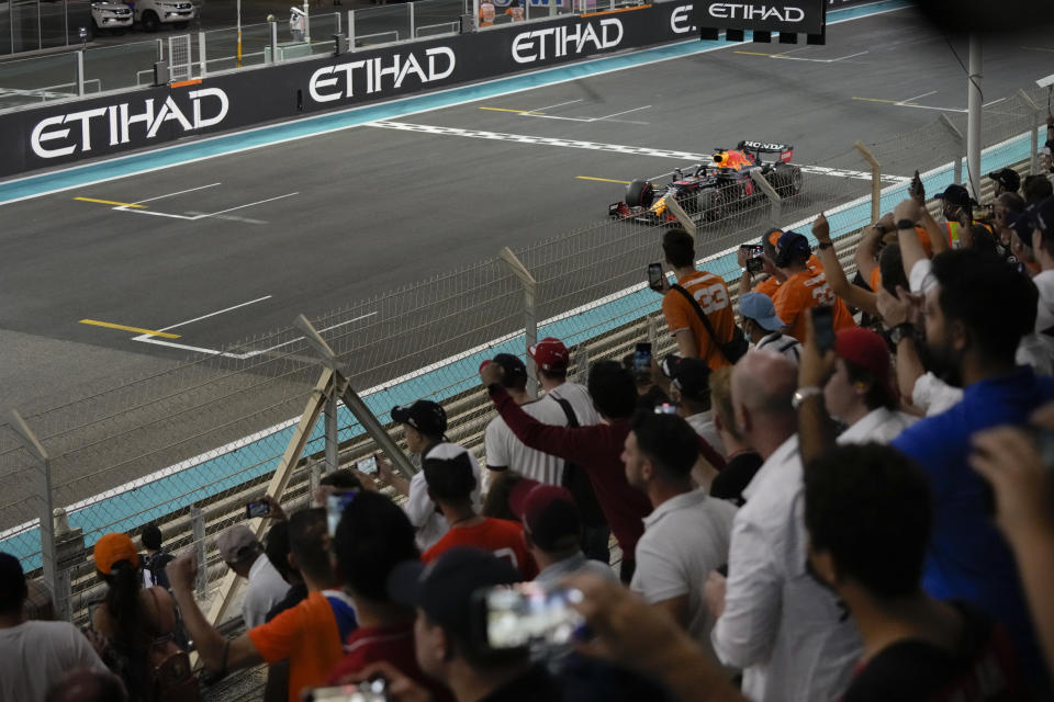 Red Bull driver Max Verstappen of the Netherlands wins the Formula One Abu Dhabi Grand Prix in Abu Dhabi, United Arab Emirates, Sunday, Dec. 12, 2021. (AP Photo/Hassan Ammar)