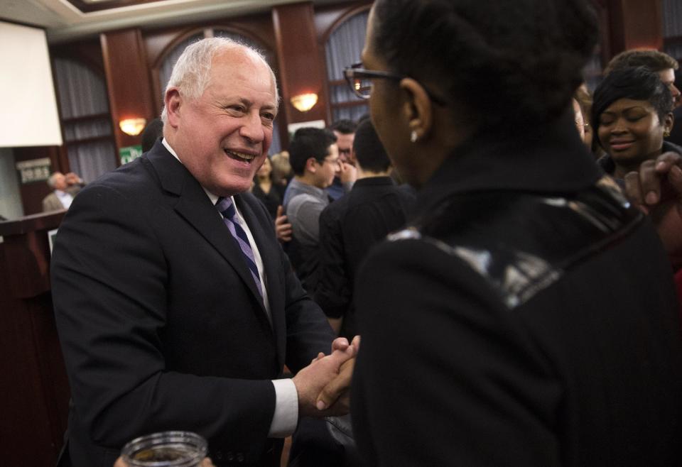 Illinois Gov. Pat Quinn greets guests after declaring his primary election victory during his election night reception on Tuesday, March 18, 2014, in Chicago. (AP Photo/Andrew A. Nelles)