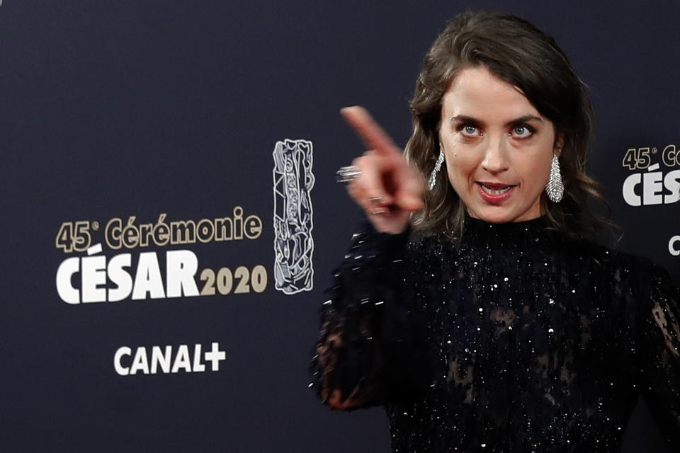 FILE - Actress Adele Haenel poses as she arrives to attend the Cesar award ceremony, the equivalent of the Oscars, Friday, Feb. 28, 2020 in Paris. Haenel, who denounced alleged sexual assault by another French director in the early 2000s when she was 15, got up and walked out of the room in 2020. As French cinema basks in Oscars attention, actresses who allege they were teenage victims of sexual abuse by directors decades older than them are shining the light on the repulsive underside of French cinema.(AP Photo/Christophe Ena, File)