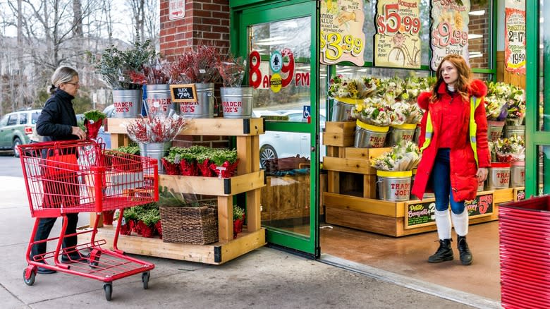 Two women shopping at Trader Joe's entrance