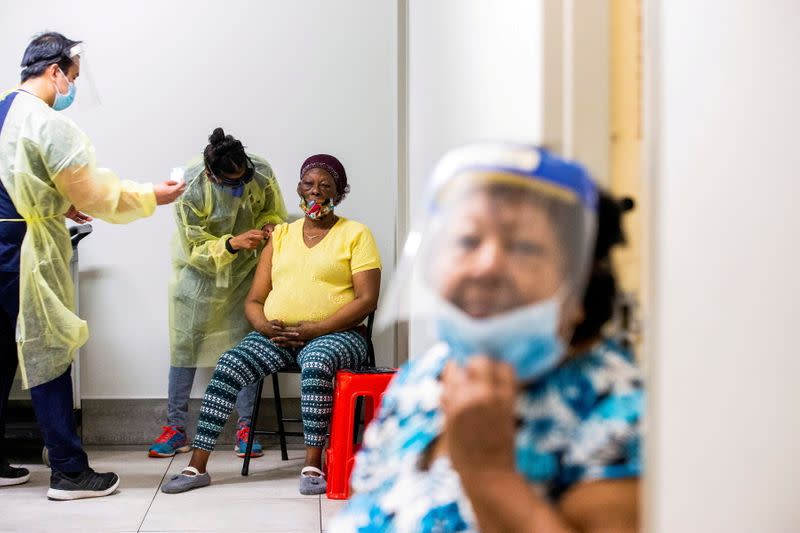 FILE PHOTO: Moderna coronavirus disease vaccination at a Toronto Community Housing seniors building