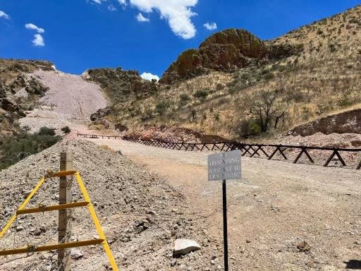 A "no trespassing" sign can be seen posted on the border road near Sasabe, Arizona.