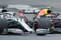 Mercedes driver Lewis Hamilton of Britain, front, steers his car followed by Red Bull driver Pierre Gasly of France during the third free practice at the Silverstone racetrack, in Silverstone, England, Saturday, July 13, 2019. The British Formula One Grand Prix will be held on Sunday. (AP Photo/Luca Bruno)