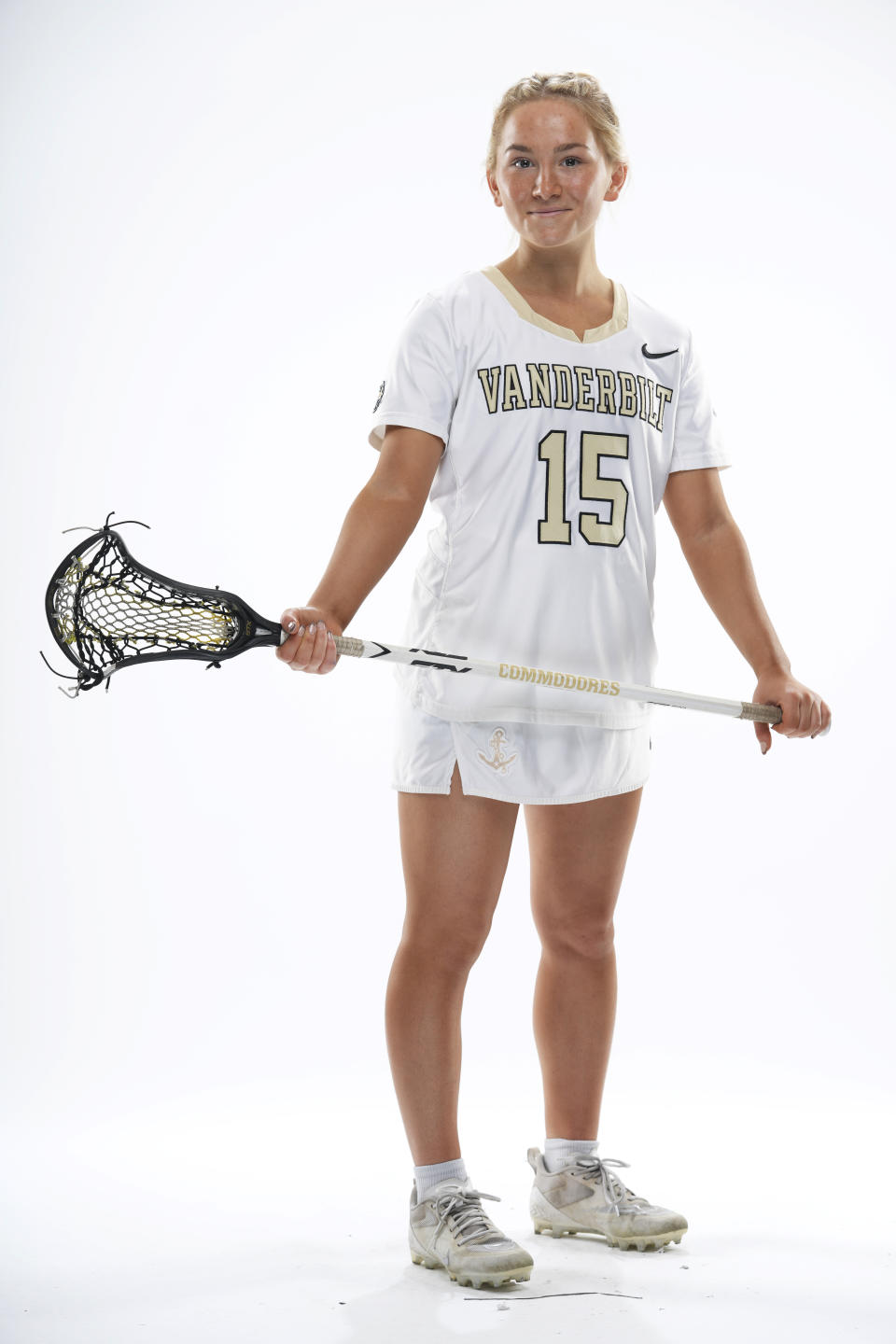 Vanderbilt lacrosse player Cailin Bracken poses for a photograph Dec. 3, 2021, in Nashville, Tenn. When she became overwhelmed by college life, especially when she had to isolate upon testing positive for COVID-19 after just a few days on campus, she decided to leave the team. Bracken wrote an open letter to college sports, calling on coaches and administrators to become more cognizant of the challenges athletes face in navigating not only their competitive side, but also their social and academic responsibilities. (Vanderbilt University via AP)