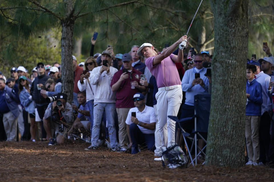 Cameron Smith, of Australia, hits back to the 15th fairway after a bad tee shot during the final round of play in The Players Championship golf tournament Monday, March 14, 2022, in Ponte Vedra Beach, Fla. (AP Photo/Lynne Sladky)