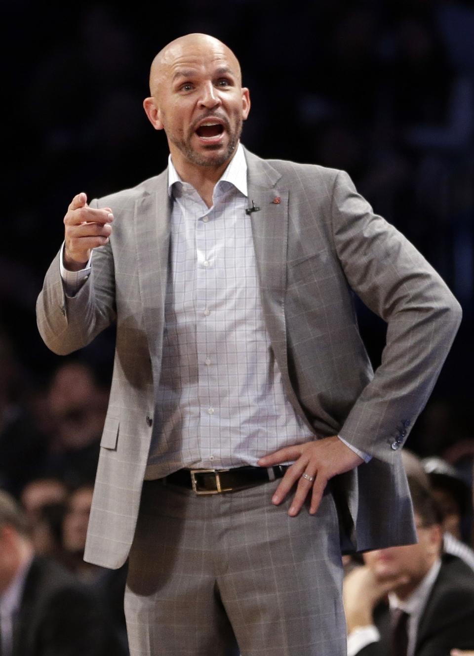 Brooklyn Nets coach Jason Kidd gestures to his team during the second half of Game 3 of an NBA basketball first-round playoff series against the Toronto Raptors on Friday, April 25, 2014, in New York. The Nets won 102-98. (AP Photo/Frank Franklin II)