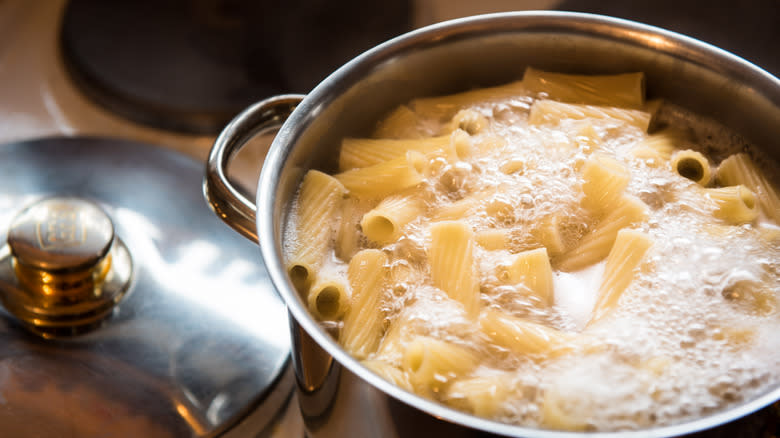 pasta boiling in pot on stove