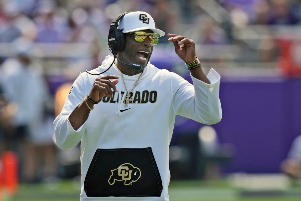 Colorado head coach Deion Sanders yells from the sidelines during the first half of an NCAA college football game against TCU Saturday, Sept. 2, 2023, in Fort Worth, Texas. (AP Photo/LM Otero)