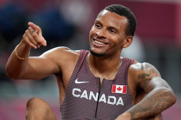 A rested and rejuvenated Andre De Grasse was all smiles after running a blazing 200m semifinal today, setting himself up as a prime medal contender in Wednesday's final. (Petr David Josek/The Associated Press - image credit)