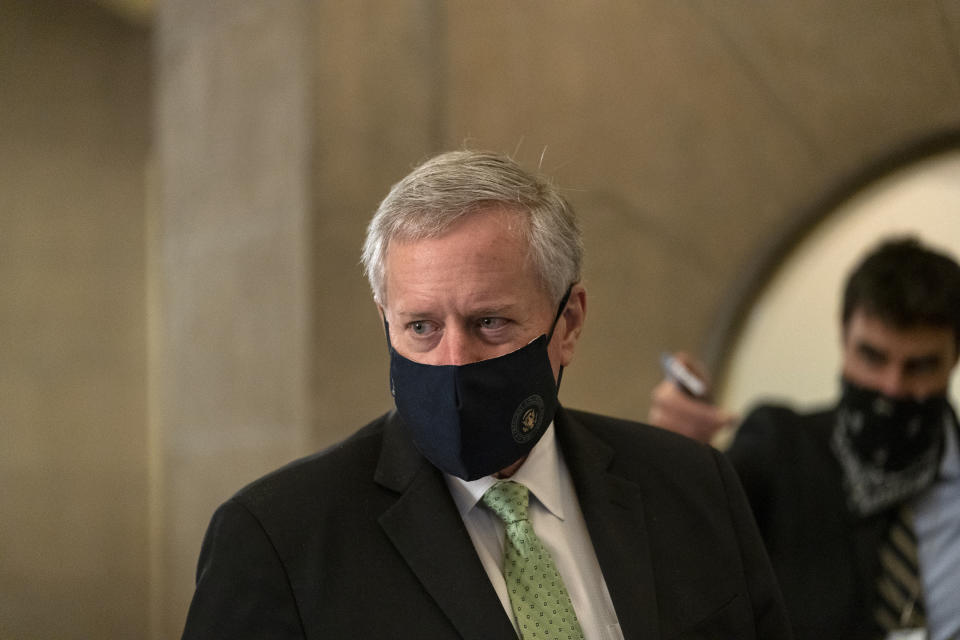 White House chief of staff Mark Meadows, speaks to media as he arrives at House Speaker Nancy Pelosi's office on Capitol Hill in Washington, Thursday, Aug. 6, 2020. (AP Photo/Carolyn Kaster)