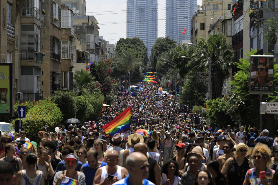 People take part in annual Gay Pride parade in Tel Aviv, Israel, Friday, June 14, 2019.(AP Photo/Tsafrir Abayov)