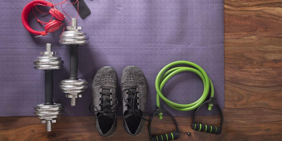 flat lay image of fitness equipment on yoga mat