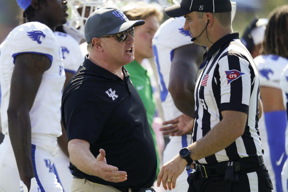 Kentucky head coach Mark Stoops yells at a referee in the second half of an NCAA college football game against Vanderbilt, Saturday, Sept. 23, 2023, in Nashville, Tenn. (AP Photo/George Walker IV)
