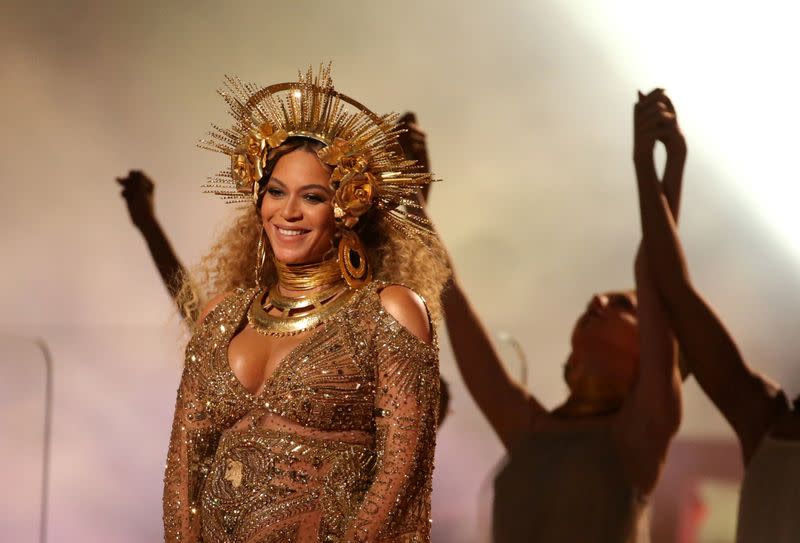 FILE PHOTO - Beyonce performs at the 59th Annual Grammy Awards in Los Angeles