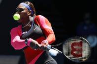 United States' Serena Williams makes a backhand return to Serbia's Nina Stojanovic during their second round match at the Australian Open tennis championship in Melbourne, Australia, Wednesday, Feb. 10, 2021.(AP Photo/Rick Rycroft)