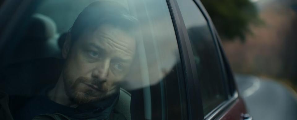 james mcavoy sitting in a police car at the end of my son