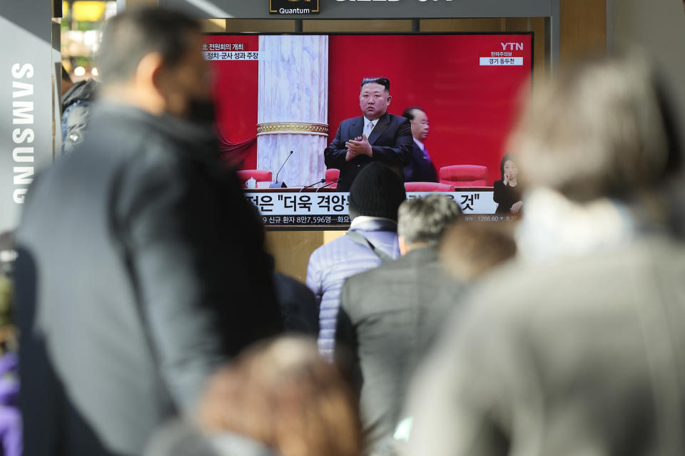 A TV screen shows a news program reporting with footage of North Korean leader Kim Jong Un in Pyongyang, at the Seoul Railway Station in Seoul, South Korea, Tuesday, Dec. 27, 2022. North Korean leader Kim called for stronger effort to overcome hardships and challenges facing his country as he opened a key political meeting after carrying out a record number of missile tests this year. (AP Photo/Lee Jin-man)