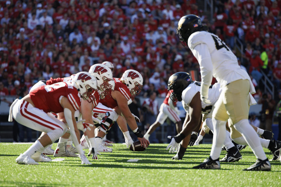 Oct 22, 2022; Madison, Wisconsin, USA; The Wisconsin Badgers line up for a play during the first quarter against the Purdue Boilermakers at Camp Randall Stadium. Mandatory Credit: Jeff Hanisch-USA TODAY Sports