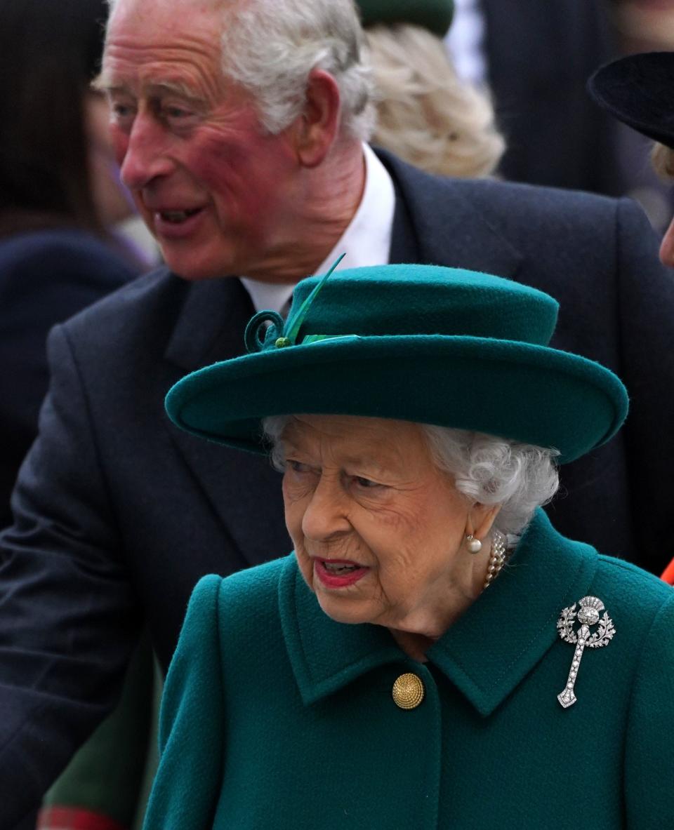 Queen Elizabeth II and Prince Charles, Prince of Wales, arrive for the opening of the sixth session of the Scottish Parliament, on Oct. 2, 2021.