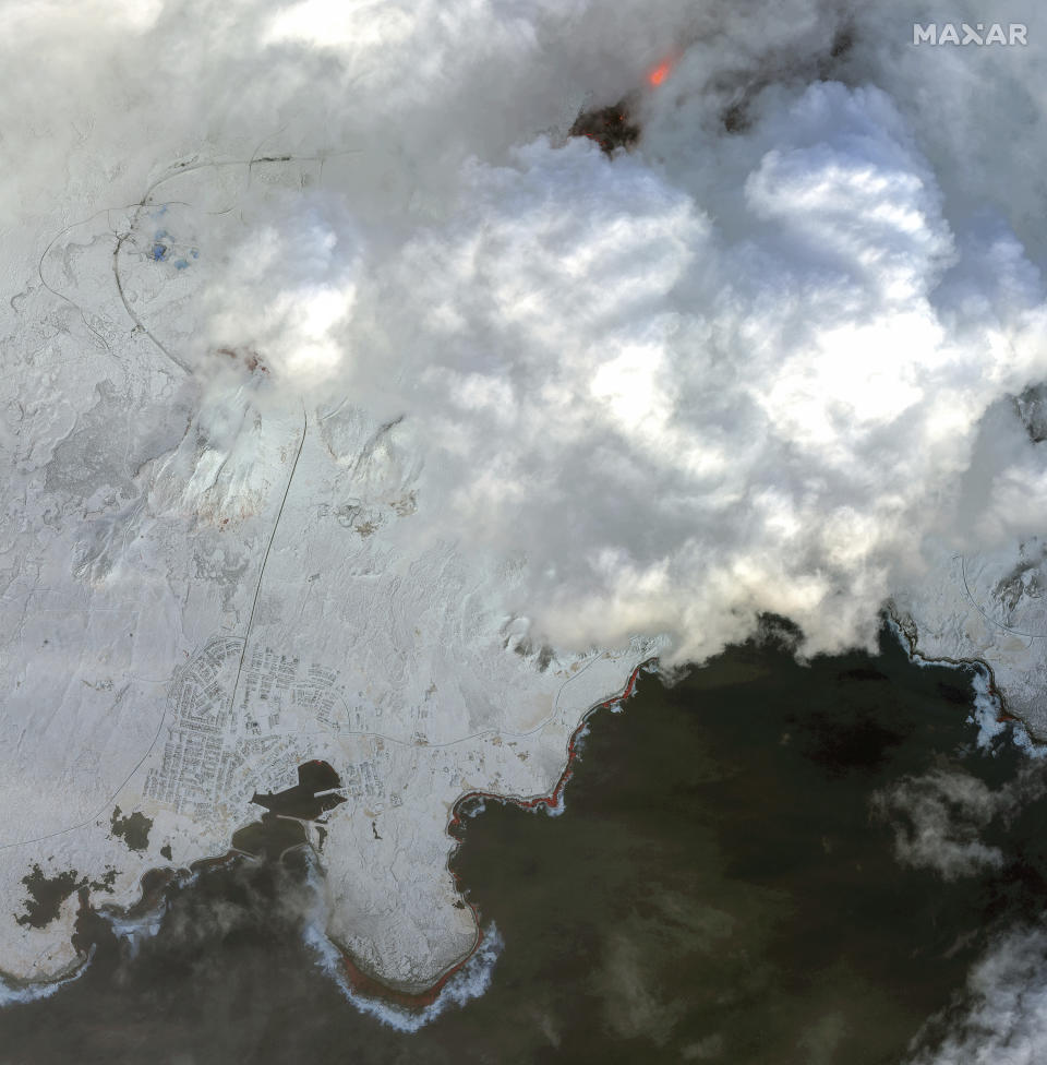 This satellite image provided by Maxar Technologies shows a color infrared overview of Grindavik and lava from a volcano in Iceland on Tuesday, Dec. 19, 2023. (Satellite image ©2023 Maxar Technologies via AP)