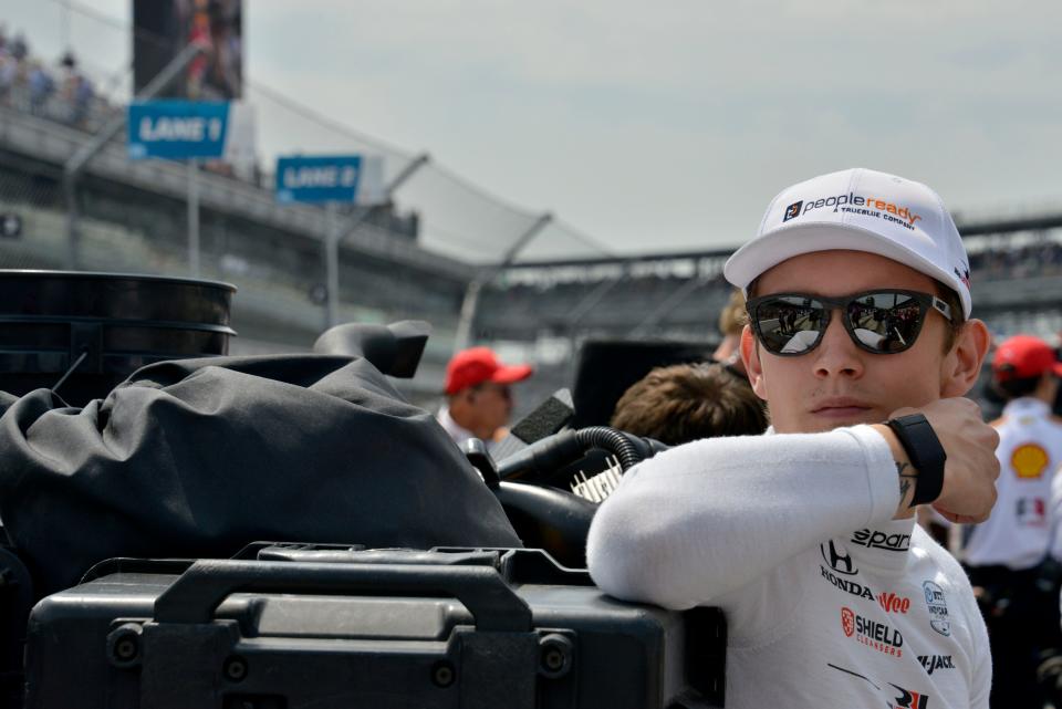 Rahal Letterman Lanigan Racing driver Christian Lundgaard (30) stands hear his pit box Saturday, May 21, 2022, during the first day of qualifying for the 106th running of the Indianapolis 500 at Indianapolis Motor Speedway