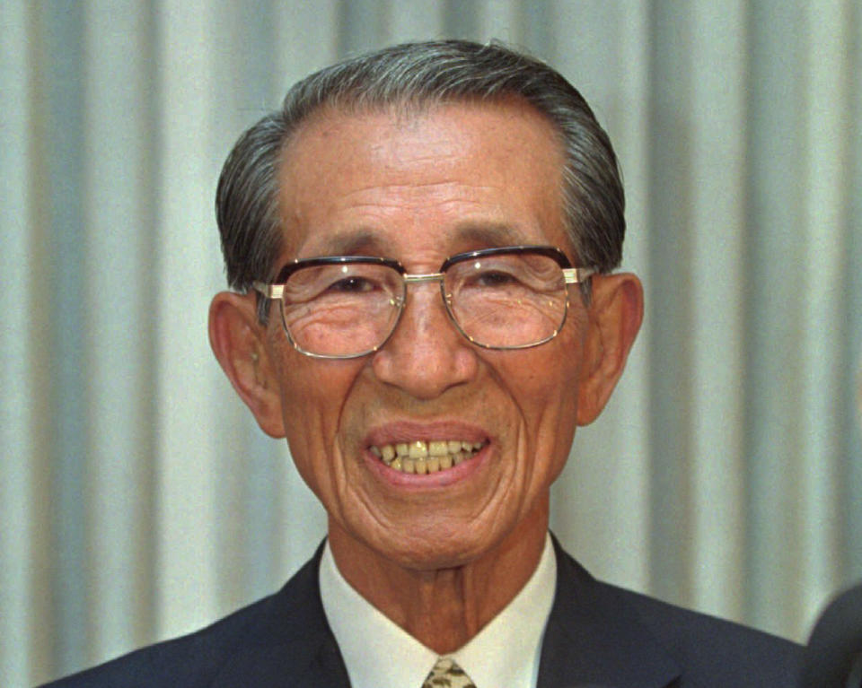 FILE - In this May 20, 1996 file photo, former Japanese straggler Hiroo Onoda answers questions from media during a news conference in a Manila hotel upon arrival for a sentimental journey. Onoda, the last Japanese imperial soldier to emerge from hiding in the jungle in Philippines and surrender after World War II, has died. He was 91. Onoda died Thursday, Jan. 16, 2014 at a Tokyo hospital. (AP Photo/Bullit Marquez, File)