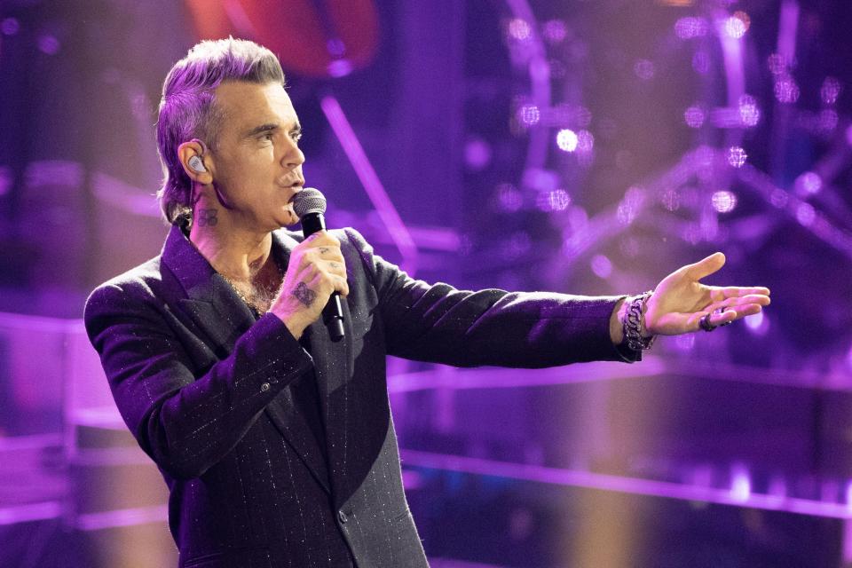 Robbie Williams performs on stage during the 