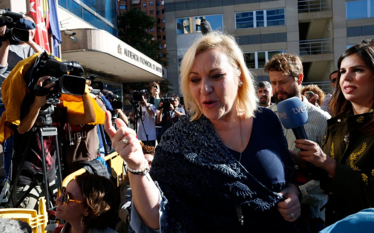 Ines Madrigal, 49, who was taken away from her mother as a newborn in 1969, arrives at a court in Madrid on Monday - AP