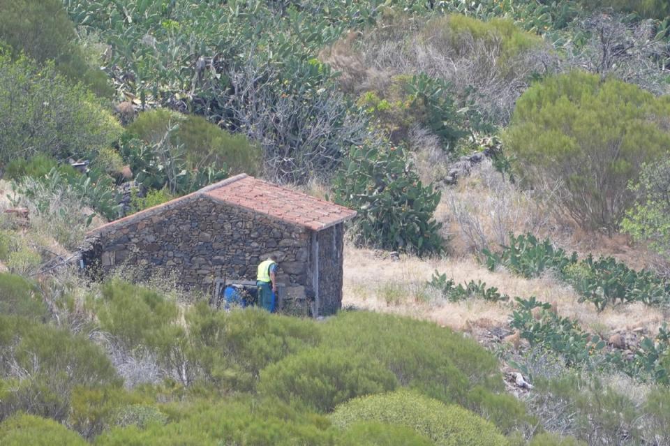 A member of a search and rescue team search near the last known location of Jay Slater (James Manning/PA Wire)