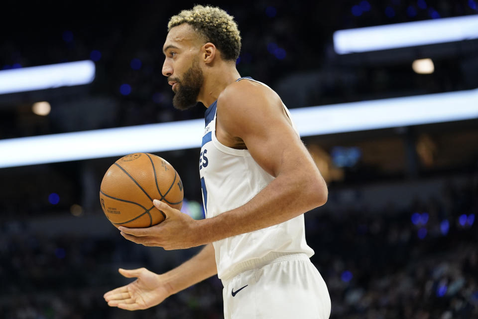 Minnesota Timberwolves center Rudy Gobert reacts to a foul call during the first half of the team's NBA basketball game against the Oklahoma City Thunder, Wednesday, Oct. 19, 2022, in Minneapolis. (AP Photo/Abbie Parr)