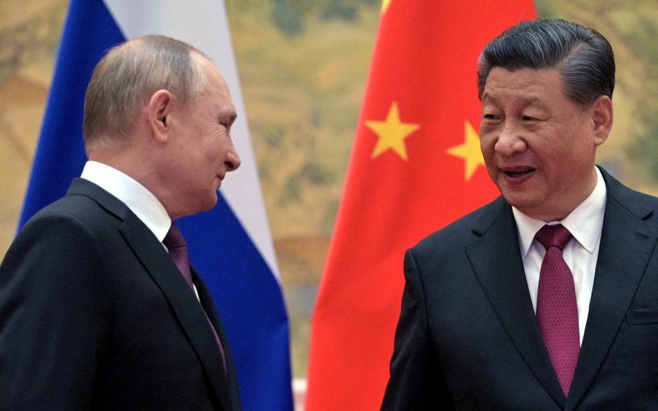 Vladimir Putin Russia Xi Jinping China invasion Ukraine - Sputnik/Aleksey Druzhinin/Kremlin via Reuters