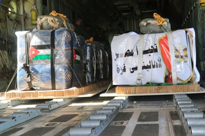 Humanitarian aid packages are seen on a plane before being dropped over Gaza. The landing operations included 3 C130 aircraft belonging to the Royal Jordanian Air Force, 3 American aircraft, an Egyptian aircraft, and a French aircraft. -/Jordanian Armed Force Website/dpa