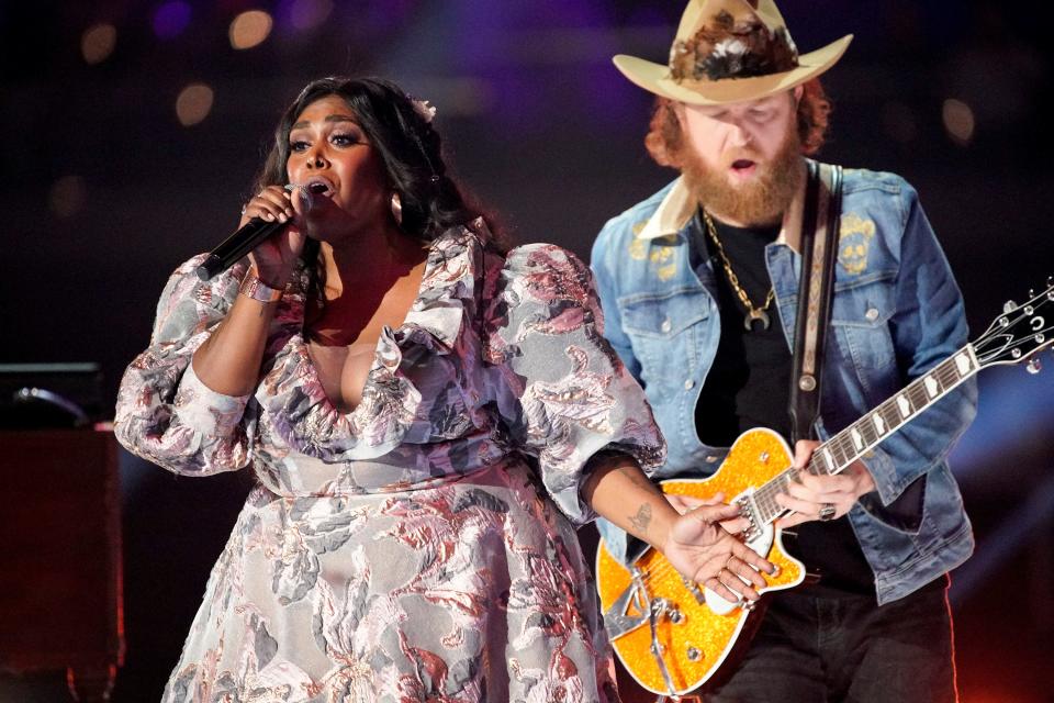 Brittney Spencer and John Osborne perform during the 2022 Academy of Country Music Awards in Las Vegas.