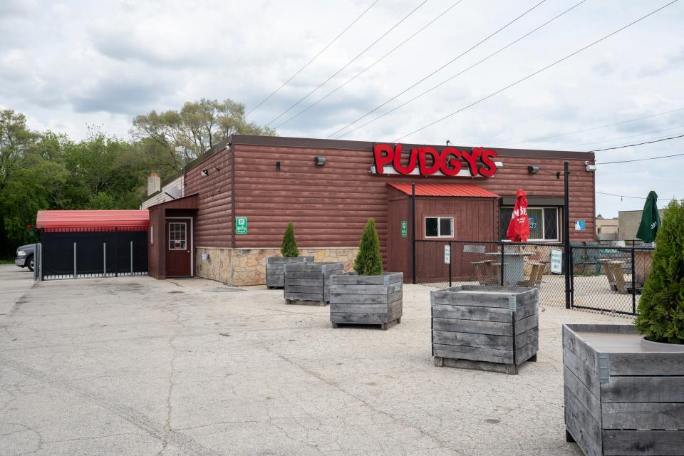 Pudgy's, the bar where Kyle Rittenhouse was seen on Jan. 5, 2021, taking pictures with Proud Boys and flashing the "OK" symbol that has been used as a symbol of white supremacy, had just a handful of regulars at the bar on a recent Thursday morning.