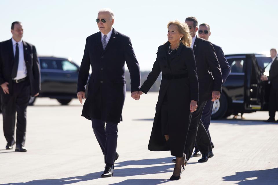 President Joe Biden and first lady Jill Biden arrive at Dobbins Air Reserve Base in Marietta, Ga., Tuesday, Nov. 28, 2023, to travel to Atlanta to attend at tribute service for former first lady Rosalynn Carter. (AP Photo/Andrew Harnik)