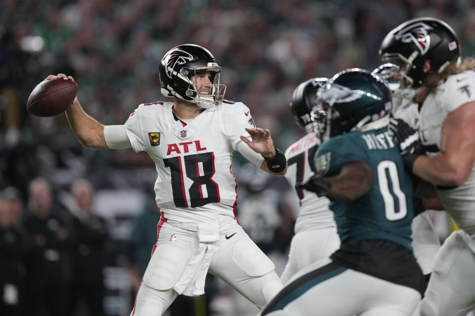 Atlanta Falcons quarterback Kirk Cousins (18) looks to pass during the first half of an NFL football game against the Philadelphia Eagles on Monday, Sept. 16, 2024, in Philadelphia. (AP Photo/Matt Rourke)