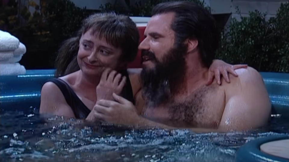 Rachel Dratch cracks up as Will Ferrell speaks in a hot tub on Saturday Night Live.