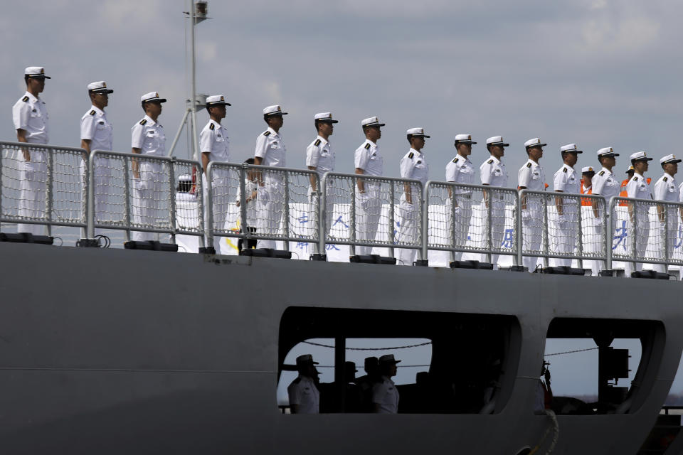 Chinese navy sailors stand in formation on board the naval training ship, Qi Jiguang, as it docks at Manila's port, Philippines Wednesday, June 14, 2023. The Chinese navy training ship made a port call in the Philippines on Wednesday, its final stop on a goodwill tour of four countries as Beijing looks to mend fences in the region. (AP Photo/Basilio Sepe)