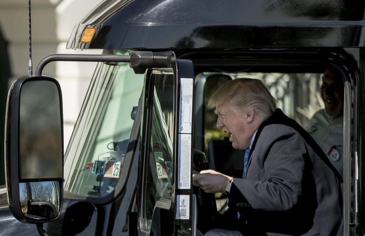 Donald Trump behind the wheel of a lorry (Rex)