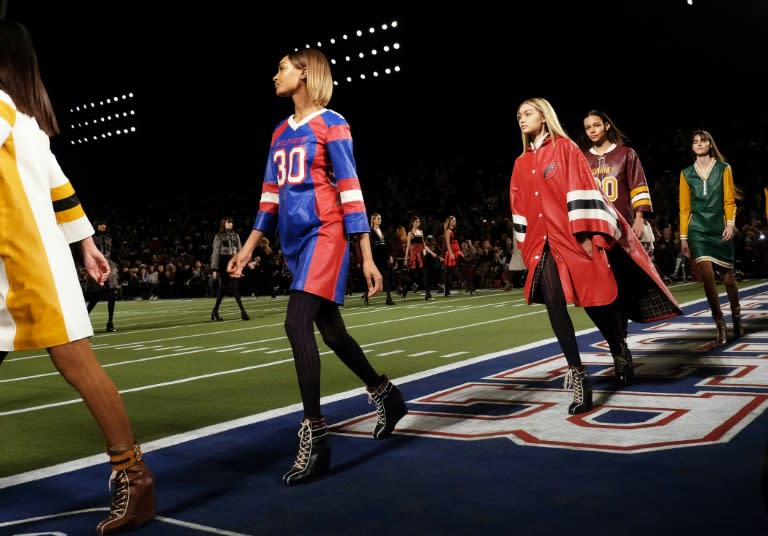 Models present creations by Tommy Hilfiger during Mercedes-Benz Fashion Week, at Park Avenue Armory in New York, in February 2015