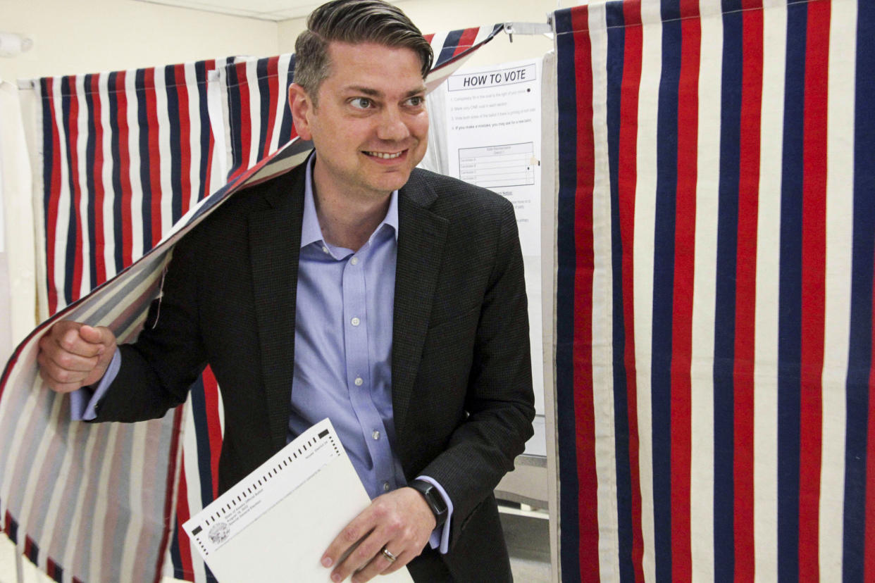 Nick Begich, a Republican candidate for both the special election and the regular primary for Alaska's open U.S. House seat, emerges from a booth after voting on Aug. 10, 2022, in Anchorage. (Mark Thiessen / AP)