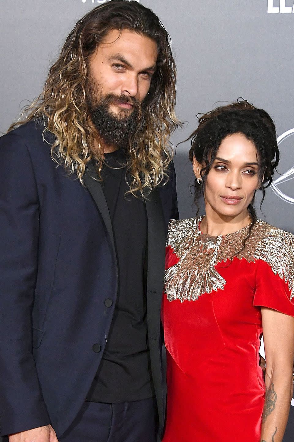 <p>Lisa nabbed herself a Dothraki ... and one who just happens to have a facial structure very similar to hers. It may be hard to see through that bushy beard, but it's all in those defined cheeks.</p>