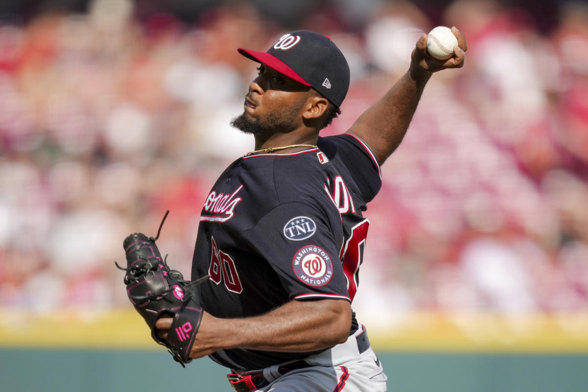 Washington Nationals manager Dave Martinez walks to the dugout after making  a pitching change during the ninth inning of a baseball game against the  Cincinnati Reds Friday, Aug. 4, 2023, in Cincinnati. (