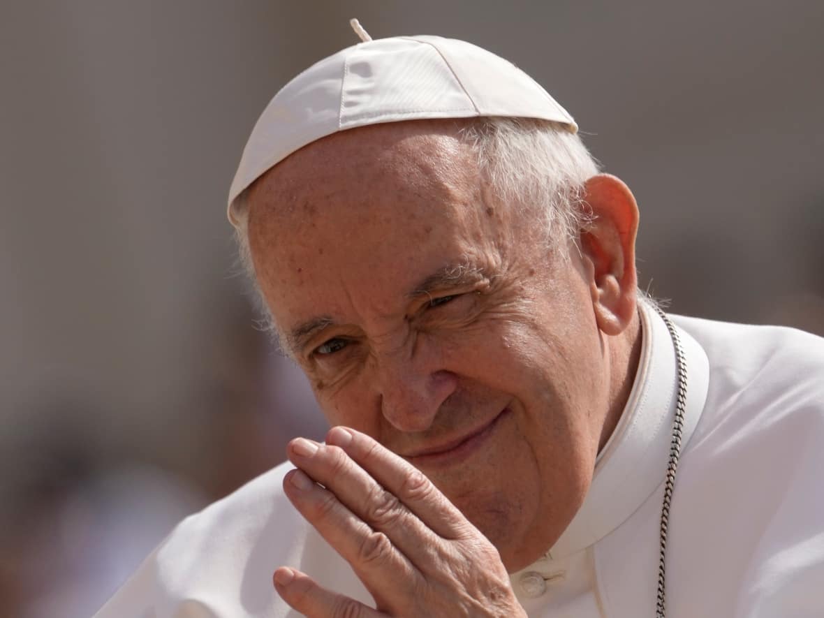 Pope Francis arrives to attend his weekly general audience in St. Peter's Square at the Vatican on June 22, 2022. The Pope will be in Canada from July 24 to 29.  (Andrew Medichini/The Associated Press - image credit)