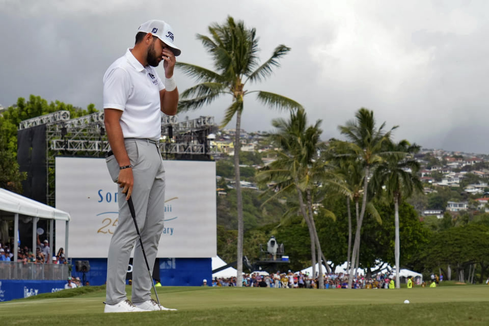 Hayden Buckley reacts to missing his birdie putt on the 18th green during the final round of the Sony Open golf tournament, Sunday, Jan. 15, 2023, at Waialae Country Club in Honolulu. (AP Photo/Matt York)