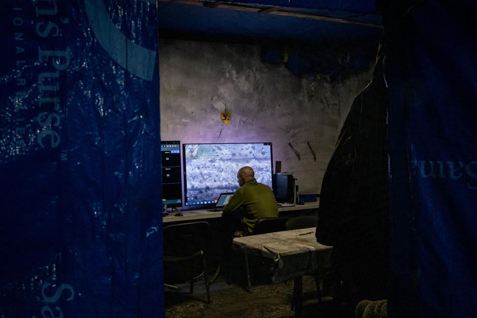 A Ukrainian military analyst reviews videos obtained by drone operators near Bakhmut in Jan. 2023. <span class="copyright">Nicole Tung—The New York Times/Redux</span>